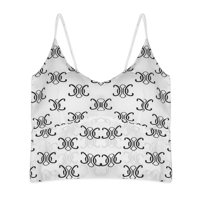 White spaghetti strap top with black pattern on a white background