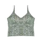 Green patterned tank top on a white background