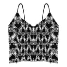 Black and white patterned top with heart and peace symbol design on a white background