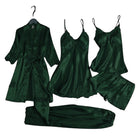 Set of green satin loungewear including a robe, nightgown, and pants on hangers against a white background.