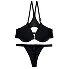 Black bra and garter belt set on a white background